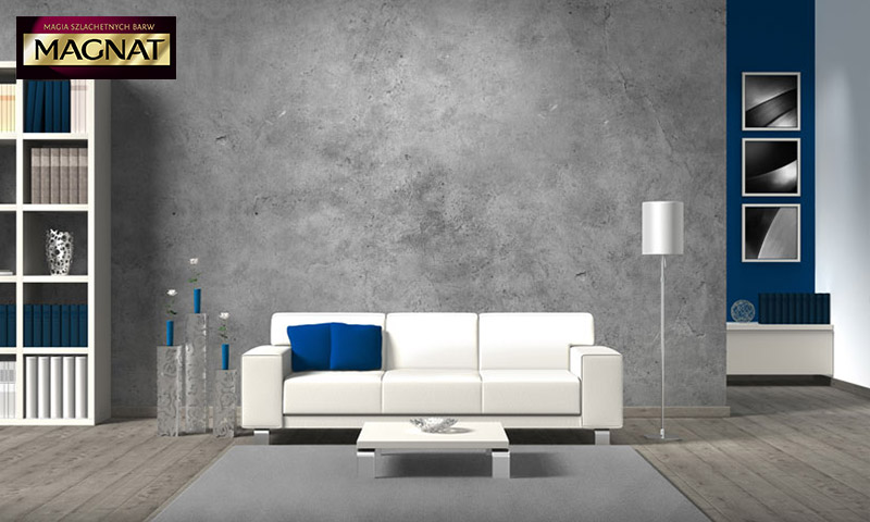 Imitacja betonu na ścianie w salonie (tło dla białej sofy)